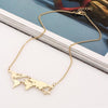 Image of VINTAGE WORLD MAP NECKLACE