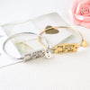 Image of SEMICOLON BANGLE